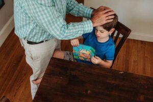 Father blesses his child